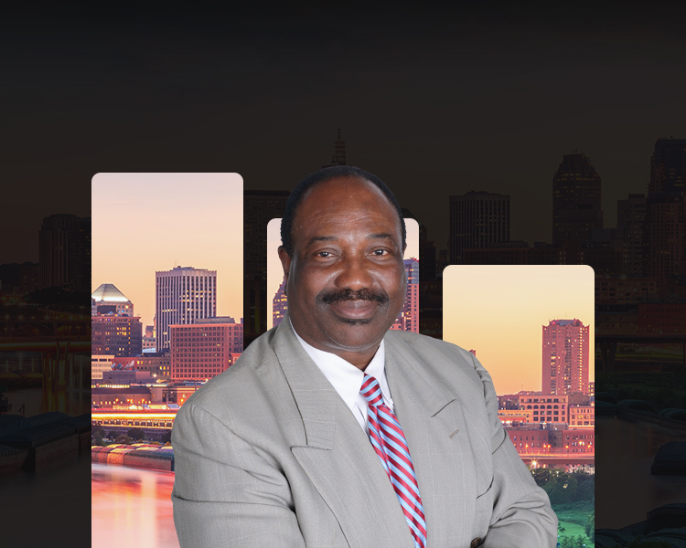 John Akwuba with St Paul Skyline in the background